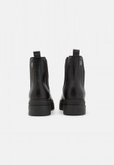 Tommy Hilfiger MONOCHROMATIC CHELSEA BOOT Platform ankle boots black MONOCHROMATIC CHELSEA BOOT Ботильоны на платформе черный